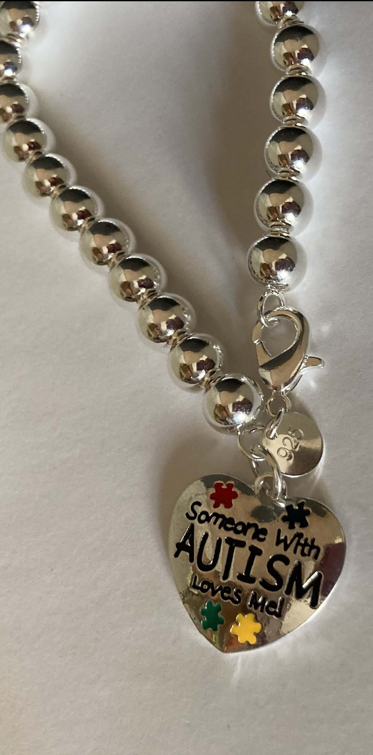Someone with Autism Loves Me Beaded Charm Bracelet - The House of Awareness